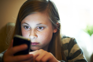 Young Female Using Smart Phone